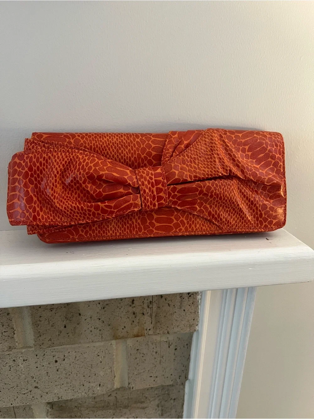 Nine West Orange Textured Bow Clutch